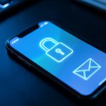 A phone showing a generic login screen with a padlock and envelope icon, illustrating password reset and email privacy