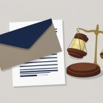 Illustration of a mail ballot envelope over a document with a gavel and scales of justice, in muted tones